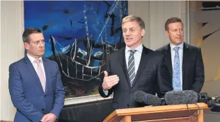  ?? PHOTO: STEPHEN JAQUIERY ?? Rare visit . . . National leader Bill English, flanked by Dunedin list MP Michael Woodhouse (left) and Health Minister Jonathan Coleman, announces the Dunedin Hospital rebuild.