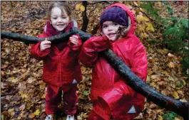  ??  ?? Youngsters have a great time in the woods in Castlemilk as part of an outdoor nurseries programme, the Welly Wanderers Pictures: Mark Gibson