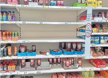  ?? ?? EMPTY: Customer favourites are missing from the shelves of some Tesco stores.