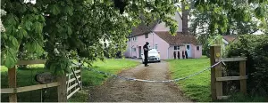  ??  ?? The cordoned-off Grade II-listed farmhouse In Barham, Suffolk, yesterday