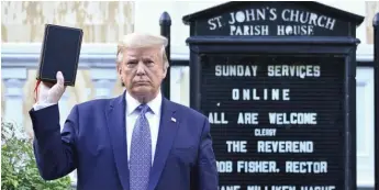  ?? GETTY IMAGES ?? Donald Trump holds up a Bible outside St. John’s Episcopal Church in Washington on June 11, 2020.