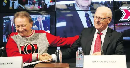  ?? JEAN LEVAC. ?? Bryan Murray was inducted into the Ring of Honour by Senators owner Eugene Melnyk at the Canadian Tire Centre in Ottawa on Friday.