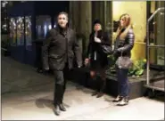  ?? FRANK FRANKLIN II — THE ASSOCIATED PRESS ?? Michael Cohen, U.S. President Donald Trump’s personal attorney, walks to his hotel Tuesday in New York. FBI agents on Monday raided Cohen’s home, hotel room and office, seizing records on topics including a $130,000 payment made to porn actress Stormy...