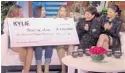  ?? ELLEN SCREENGRAB/COURTESY ?? Ellen DeGeneres and Kris and Kylie Jenner surprised Samantha Gil and members of her Miami nonprofit Nest of Love with a check for $150,000, the first of many.