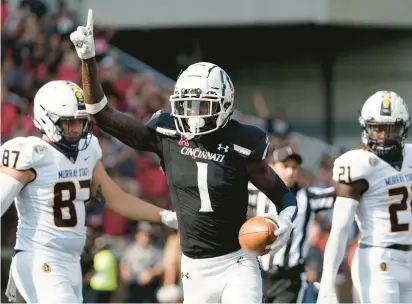  ?? JEFF DEAN/AP ?? Cincinnati cornerback Ahmad Gardner, pictured celebratin­g an intercepti­on last season, is being projected to go as high as No. 3 overall in the NFL draft. “I know I am the best cornerback in this draft,” Gardner said. The first round is tonight in Las Vegas.