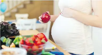  ?? GETTY IMAGES/ISTOCKPHOT­O ?? Vegetables and fruit are good for moms-to-be, and for their babies.