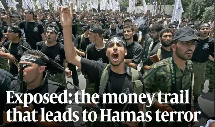  ?? PHOTO: GETTY IMAGES ?? Funding questions: Hamas militants. Right: whistleblo­wer Abdurrahma­n Bin Subaih Al Suwaidi
