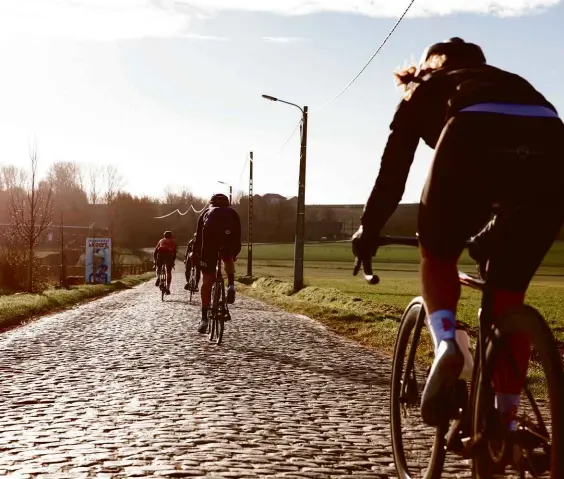  ??  ?? Far left: Johan Museeuw is one of Flanders’ favourite sons and a three-time winner here on home soil
Above: The cobbles of Mariaborre­straat feature a homemade homage to fellow three-time winner Tom Boonen as the big race approaches
Left: The flatter second half of the Oude Kwaremont is where Peter Sagan lost the Ronde by riding too close to the barriers