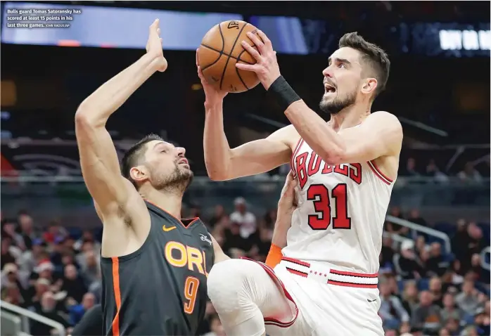  ?? JOHN RAOUX/AP ?? Bulls guard Tomas Satoransky has scored at least 15 points in his last three games.