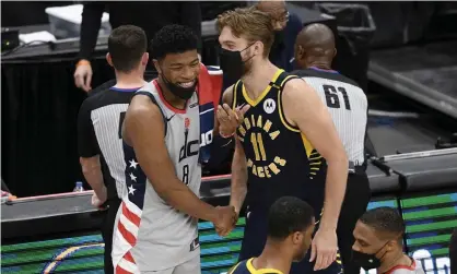  ??  ?? Washington Wizards forward Rui Hachimura (8) and Indiana Pacers forward Domantas Sabonis (11) meet up after Thursday night’s game. Photograph: Nick Wass/AP