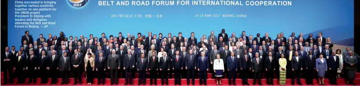  ??  ?? China succeeded in bringing together various countries together on one platform for the OBOR project President Xi Jinping with leaders and delegates attending the Belt and Road Forum in Beijing.