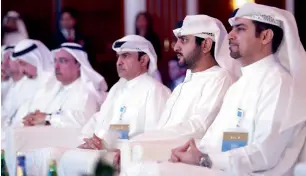  ?? — Wam ?? Shaikh Maktoum bin Mohammed bin Rashid Al Maktoum, Sami Al Qamzi and other officials at the Dubai Investment Forum on Tuesday.