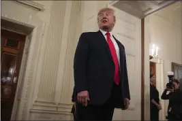  ?? EVAN VUCCI — THE ASSOCIATED PRESS ?? President Donald Trump talks to reporters during NCAA Collegiate National Champions Day at the White House on Friday in Washington.