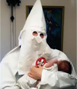  ??  ?? Extremists: Claudia Patatas and Adam Thomas with their baby and a Nazi flag, and Thomas in a KKK robe with the child