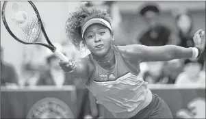  ?? AP PHOTO ?? Japan’s Naomi Osaka returns a shot against Kazakhstan’s Zarina Diyas during their second round match of the French Open tennis tournament at the Roland Garros stadium in Paris, France, Wednesday.