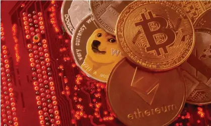  ?? ?? Representa­tions of cryptocurr­encies Bitcoin, Ethereum, DogeCoin, Ripple and Litecoin. Photograph: Dado Ruvić/Reuters