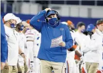  ?? MICHAEL AINSWORTH/AP ?? Florida head coach Dan Mullen said he is focused on the Gators, not the NFL, but said much about the future of college football makes him and many of his peers nervous.