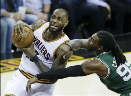  ?? TONY DEJAK - THE ASSOCIATED PRESS ?? Cleveland Cavaliers’ LeBron James (23) goes up for a shot against Boston Celtics’ Jae Crowder (99) during the second half of Game 4 of the NBA basketball Eastern Conference finals, Tuesday, in Cleveland. The Cavaliers won 112-99.