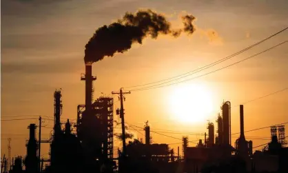  ?? Photograph: Mark Felix/AFP via Getty Images ?? A refining plant in Houston. From the 1960s, a mass of files shows the oil industry began to grasp the damage to health caused by the burning of fossil fuels.