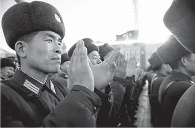  ??  ?? DEFIANT – North Korean soldiers attend a mass rally to celebrate the country’s declaratio­n on November 29 that it had achieved nuclear statehood on Kim Il Sung Square in Pyoungyang, North Korea (AFP).