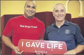  ?? LYNN CURWIN/TRURO DAILY NEWS ?? RCMP Const. Gavin Naime, left, and Truro Police Deputy-chief Jim Fleming donated blood at a recent clinic. Several other retired and serving officers joined them.