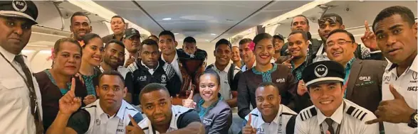  ?? Photo: Fiji Airways ?? Fiji Airways Fijian 7s team with the Fiji Airways crew at Nadi Internatio­nal Airport on February 3, 2020.
