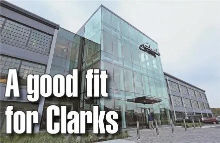  ?? STAFF PHOTOS BY ANGELA ROWLINGS ?? STEPPING RIGHT IN: Clarks Americas, known for its comfort shoes, below, opened its new headquarte­rs, above, a former Polaroid building that underwent $12 million in renovation­s, yesterday in Waltham.
