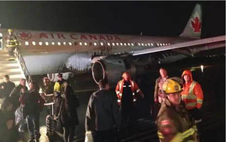  ?? PAUL VARIAN ?? “The pilot applied heavy brakes and we came to a sudden and complete stop,” passenger Paul Varian said of an abrupt landing at Pearson on Friday night.