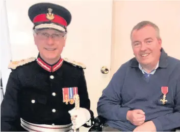  ??  ?? Well deserved Stirling Lord Lieutenant Alan Simpson with OBE recipient Dr Stewart Arnold