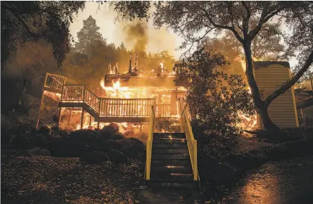  ?? Nina Riggio / Special to The Chronicle ?? One of the structures at the renowned Meadowood Napa Valley resort is destroyed as the Glass Fire rages through St. Helena.