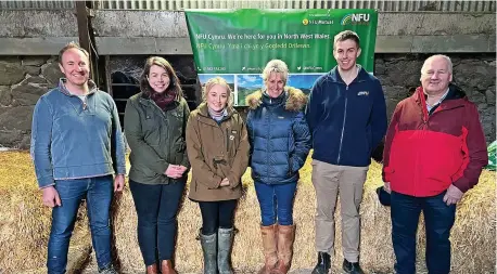  ?? ?? ■ (Left to right) NFU Cymru Meirionnyd­d County Chairman Rhodri Jones; NFU Cymru Next Generation Group member Awel Mai Hughes; NFU Student & Young Farmer Ambassador Erin Fflur McNaught; NFU President Minette Batters; NFU Cymru Next Generation