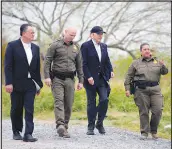  ?? EVAN VUCCI / ASSOCIATED PRESS ?? President Joe Biden looks over the southern border Thursday in Brownsvill­e, Texas, during a visit with U.S. Border Patrol officials.