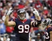  ?? ERIC CHRISTIAN SMITH — THE ASSOCIATED PRESS ?? Houston Texans defensive end J.J. Watt re-injured his back and is out until at least December, and possibly the entire season.