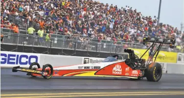  ?? Photos by Gary Nastase ?? Doug Kalitta pilots his Top Fuel dragster in NHRA qualifying Saturday afternoon at Sonoma Raceway.