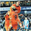  ??  ?? Double joy: Miguel Almiron celebrates with Joelinton after his second goal