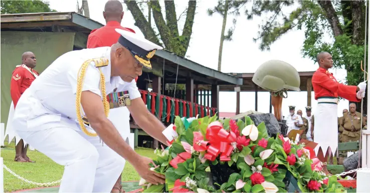  ?? Photo: Ronald Kumar ?? RFMF Commander Rear Admiral Viliame Naupoto laying a wreath to remember the three loyal soldiers who was killed during the November 2000 mutiny at Queen Elizabeth Barracks in Nabua.