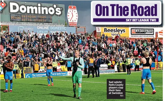  ?? REX ?? Sad salute: Notts County players clap their fans at Swindon