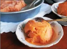  ?? PHOTO BY EMILY RYAN ?? Transform peaches or other summer fruit into a delicious frozen dessert. No churning required.