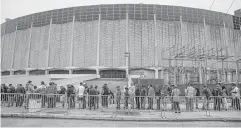  ?? Michael Ciaglo / Associated Press ?? Houstonian­s stand in line to enter the world famous Astrodome for the recent celebratio­n of the building’s 53rd anniversar­y.