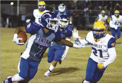  ?? IVPRESS FILE PHOTO ?? Central Union High’s Marcus Moore gives a stiff arm as he runs the ball against Brawley Union High during the 2019 Bell Game in El Centro.