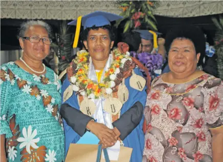  ?? Photo: Simione Haravanua ?? Litiana Tuidrakula (middle), 51, of the Methodist Church of Fiji after the Pacific Theologica­l College graduation on November 8, 2018.