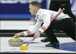  ?? ASSOCIATED PRESS PHOTO ?? Canada’s skip Brad Gushue delivers a stone against Czechia at the men’s Curling World Championsh­ips on Saturday in Schaffhaus­en, Switzerlan­d. Italy’s Joel Retornaz drew the four-foot ring in an extra end for a 7-6 victory over Canada on Monday at the world men’s curling championsh­ip.