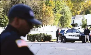  ?? (AP) ?? PIPE BOMB RECIPIENT – Police guard the property owned by former Secretary of State Hillary Clinton and former president Bill Clinton in Chappaqua, New York, after a “functional explosive device” was found at the Clintons’ suburban home.