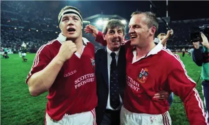  ?? Photograph: Rex/ Shuttersto­ck ?? Was it something he said? Ian McGeechan with Lions Paul Wallace and Gregor Townsend celebrate victory in 1997.