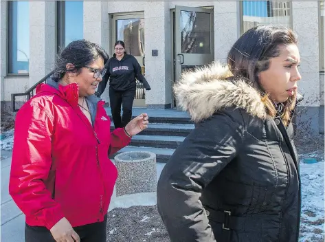  ?? BRANDON HARDER ?? Tia Pinacie-Littlechie­f, right, leaves the Court of Queen’s Bench with supporters after being found not guilty of second-degree murder in the stabbing death of Justin Crowe. People in the courtroom sobbed and shouted obscenitie­s when the jury announced...