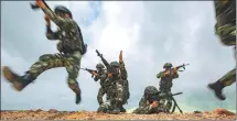  ?? YU HAIYANG / FOR CHINA DAILY ?? Members of the People’s Armed Police Force participat­e in an anti-terrorism exercise in Fangchengg­ang, Guangxi Zhuang autonomous region, in May.