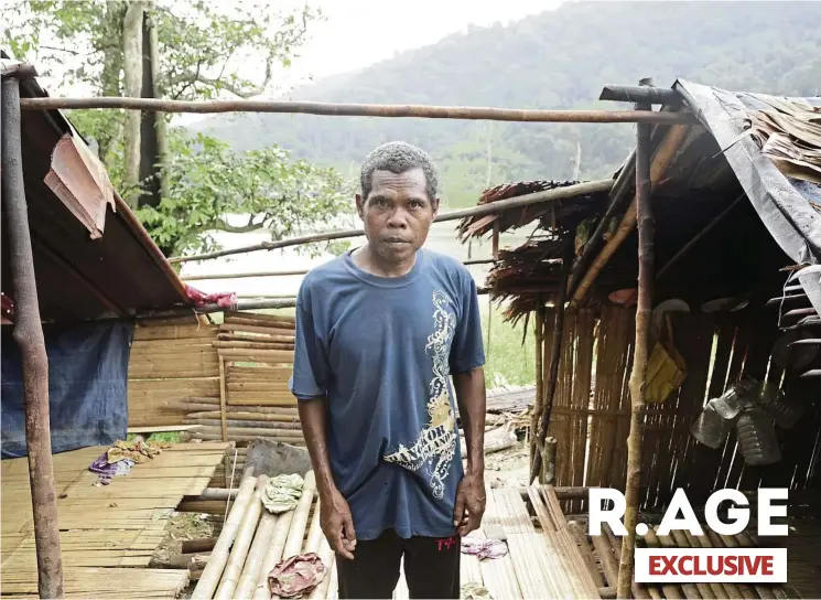  ?? ― ELROI YEE/ R. AGE ?? Kederi of the indigenous ahai tribe standing in the partially destroyed room where he and his family lived. It was torn apart by elephants in the middle of the night causing the entire village to literally
run for the hills. Our R. AGE video crew...