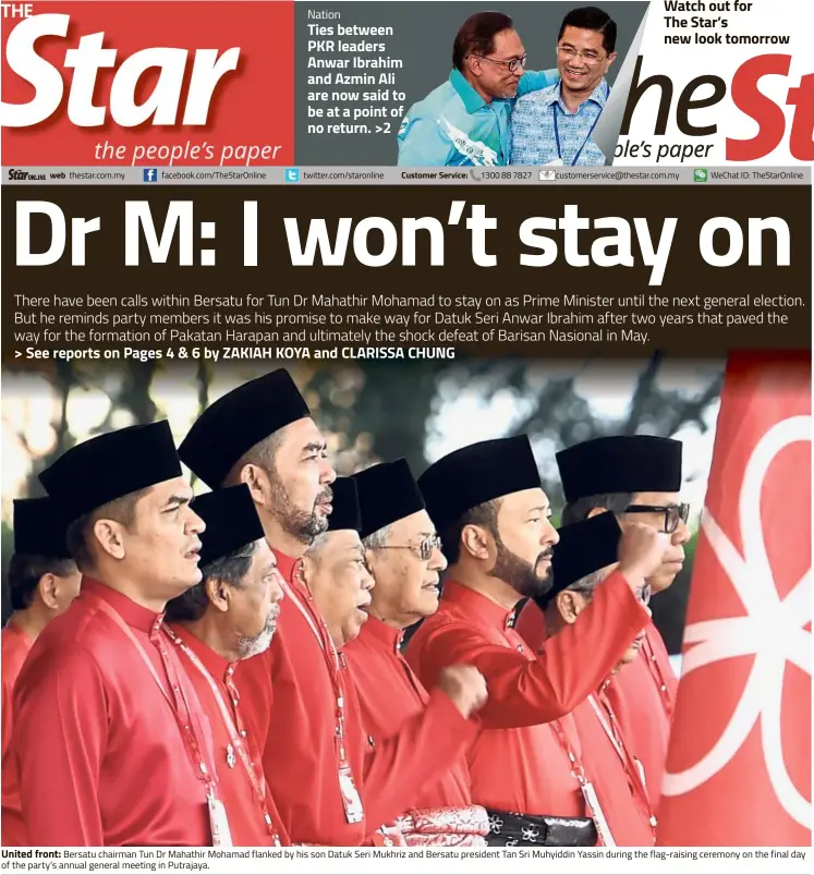  ??  ?? United front: Bersatu chairman Tun Dr Mahathir Mohamad flanked by his son Datuk Seri Mukhriz and Bersatu president Tan Sri Muhyiddin Yassin during the flag-raising ceremony on the final day of the party’s annual general meeting in Putrajaya.