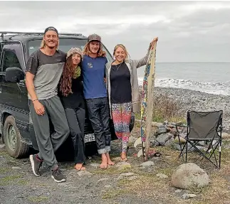  ?? PHOTO: PIPPA BROWN/STUFF ?? Surfers and environmen­talists, from left, Konstantin Kleimann, Marcela Acosta, Connor Stapley and Georgia Phelps work in Kaiko¯ ura and regularly help cleanup the Kiwa Rd beach they call home.