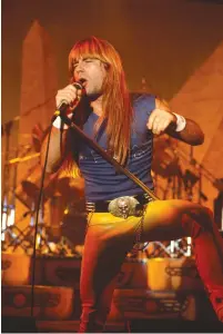  ?? (Courtesy/Wikimedia Commons) ?? BRUCE DICKINSON today, and back in the day in full metal regalia with Iron Maiden.